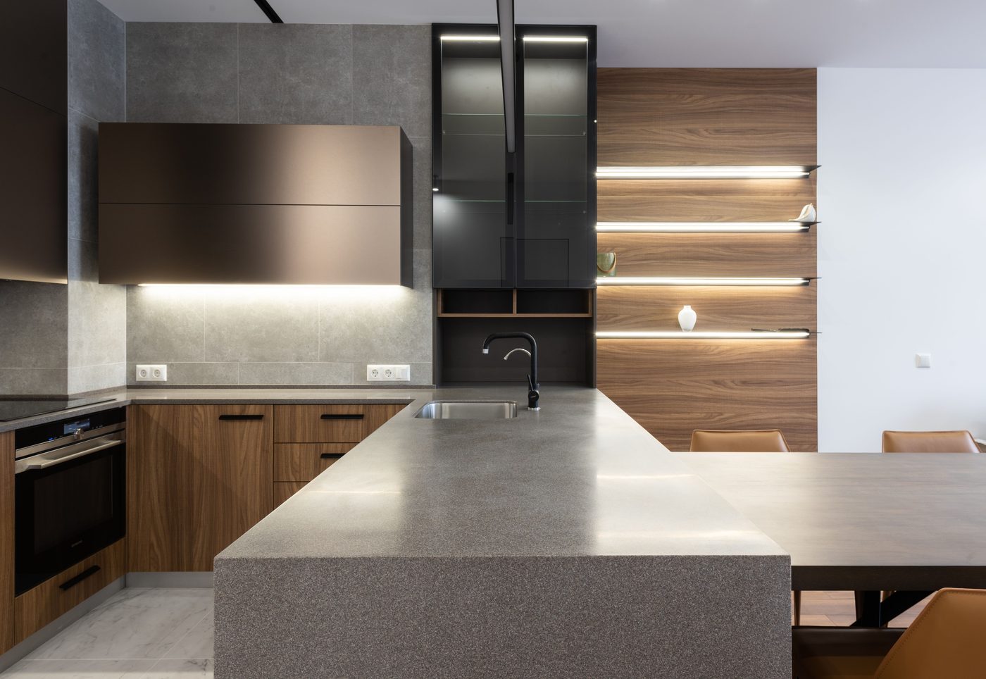 Contemporary kitchen with warm wood and floating shelves